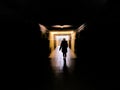 Walking into the light, conceptual image. Royalty Free Stock Photo
