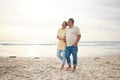 Walking, love and senior couple at beach happy, relax and bond in nature together. Ocean, embrace and old people at the