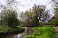 Walking from Lower Slaughter to Upper Slaughter in the Cotswold England along the river Eye