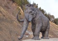 Walking mammoth against precipice