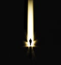 Walking man, faith and miracle light with shadow showing beam and spotlight for hope. Male, silhouette and entrance with Royalty Free Stock Photo