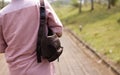 Walking Man With A Sling Bag