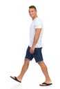 Walking Man In White T-shir And Looking At Camera. Royalty Free Stock Photo