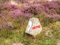 Walking marker post with footprint, het Gooi, Netherlands