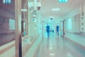 Walking medical workers in the hospital on the background of drip Royalty Free Stock Photo