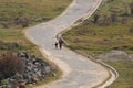 Walking mother & son by road at Bhutan