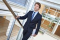 Walking, office and business man on stairs with documents, paperwork and clipboard. Professional, corporate lawyer and Royalty Free Stock Photo