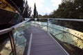 walking path in the Mobius Strip attraction, fenced with glass railings