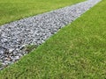 Walking path in a grass field