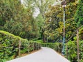 walking path at Jardin du Grand Rond ou Boulingrin, an historic park includes a fountain, gazebo & flower gardens, plus sculptures