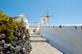 Walking path leading to the Oia windmill on the island of Santorini (Thera). Cyclades islands,Greece. Royalty Free Stock Photo