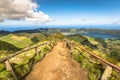 Walking path leading to a view on the lakes of Sete Cidades and Santiago in Sao Miguel, Azores Royalty Free Stock Photo