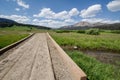 Walking path platform across a small creek in Brooks Lake Wyoming USA