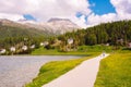 Walking path at Saint Moritz lake, Switzerland in summer Royalty Free Stock Photo