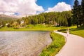 Walking path at Saint Moritz lake, Switzerland in summer Royalty Free Stock Photo