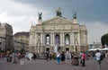 Walking people at the square in front of opera house