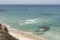 Walking and Playing on the Mediterranean Beach at Netanya in Israel with Small Boats in Sea Royalty Free Stock Photo