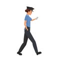 Walking policewoman with mobile phone