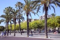 People walking at the promenade by port Olympic