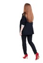 Walking red head business woman. Royalty Free Stock Photo