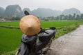 Walking on a rented motorcycle or motorbike in Asia