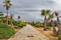 Walking road along the playa Sa Bassa des Cabots in gloomy weather. Colonia Sant Jordi. Mallorca island