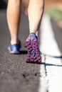 Walking or running legs on aspahlt road, adventure and exercising Royalty Free Stock Photo