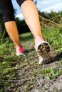 Walking or running legs in forest, summer activity Royalty Free Stock Photo