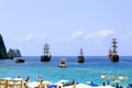 Walking sailing ships for sea excursions are anchored opposite the beach Antalya, Turkey