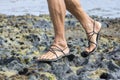 Walking in sandals on coral reef Royalty Free Stock Photo