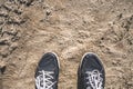 Walking shoes on muddy road