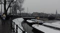 Walking on the Snowy Canals of Amsterdam