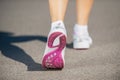 Walking in sports shoes. Royalty Free Stock Photo