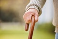 Walking stick, support and elderly with hands of person with a disability for injury, osteoporosis and medical Royalty Free Stock Photo