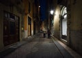 Walking through the streets of night Florence.