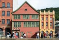 Walking tourists Bryggen street Bergen Norway