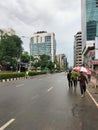 Walking tourists on a sunny summer day after rain, Dhaka, Bangladesh