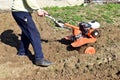 Walking Tractor on rice field for work plow  Plows machine small tractor use for till the soil before rice cultivation  Euopean Royalty Free Stock Photo