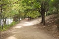 A walking trail along an urban river Royalty Free Stock Photo