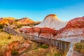 Walking trail with wooden stairs around the Hallett Cove Sugarloaf at sunset