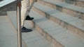 Walking upstairs: close-up view of man`s leather shoes business stairs run walk