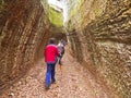 Walking through the Via Cava, an ancient Etruscan road carved through tufo cliffs in Tuscany