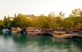 Walking vintage boats on the lake. Autumn location. Turkey, Manavgat