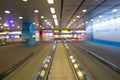 Walking way through inside terminal building of airport