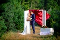 Walking wedding couple in the forest. groom bride stroking hair. selective focus Royalty Free Stock Photo