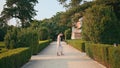 Walking woman looking park beauty at weekend. Lady strolling beautiful garden Royalty Free Stock Photo