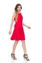 Walking Woman In Red Dress And High Heels Is Smiling Royalty Free Stock Photo