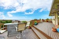 Walkout deck with patio area and water view Royalty Free Stock Photo