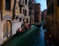 Walks along the canals of Venice. Gondoliers. The romance of Venice. Italy Royalty Free Stock Photo