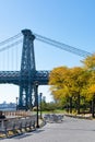 Walkway along the East River Park by the Williamsburg Bridge on the Lower East Side of New York City during Autumn Royalty Free Stock Photo